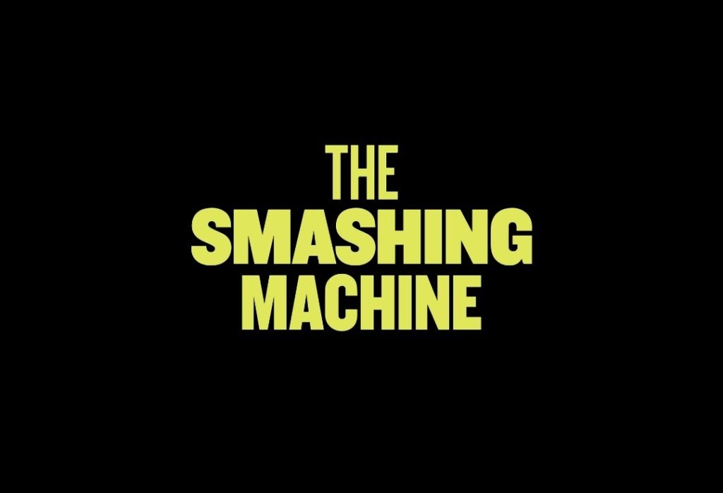 alt="Title graphic for the film 'The Smashing Machine' featuring bold yellow block lettering centered on a black background."
