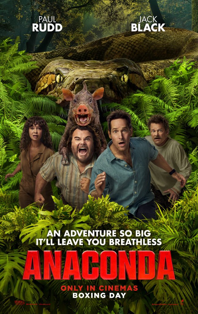 alt="Poster for the 2025 film 'Anaconda' showing four characters in a dense green jungle, one carrying a wild boar on his shoulders, all looking alarmed as if reacting to danger, with