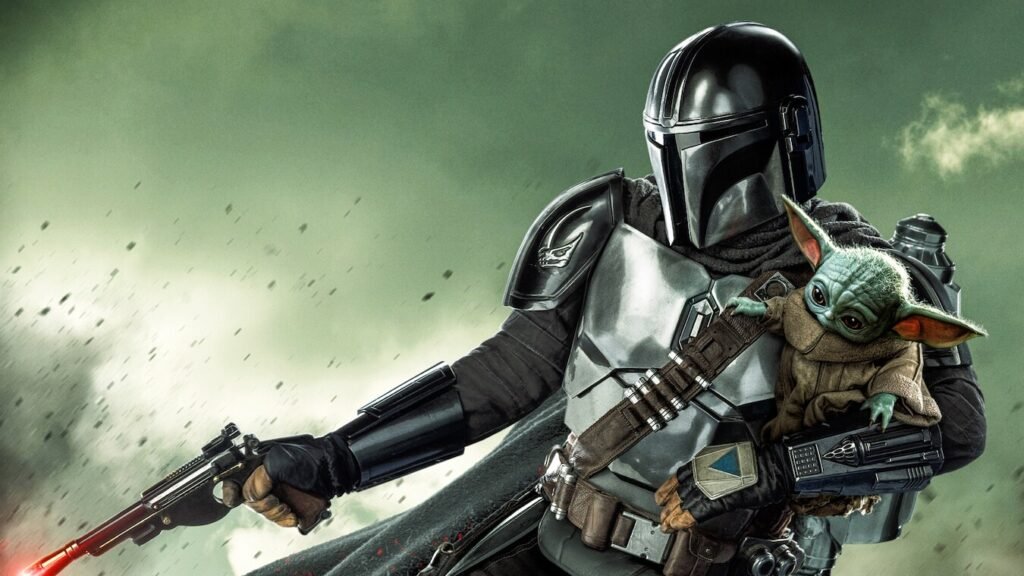 alt="The Mandalorian holding Grogu against a stormy green sky."