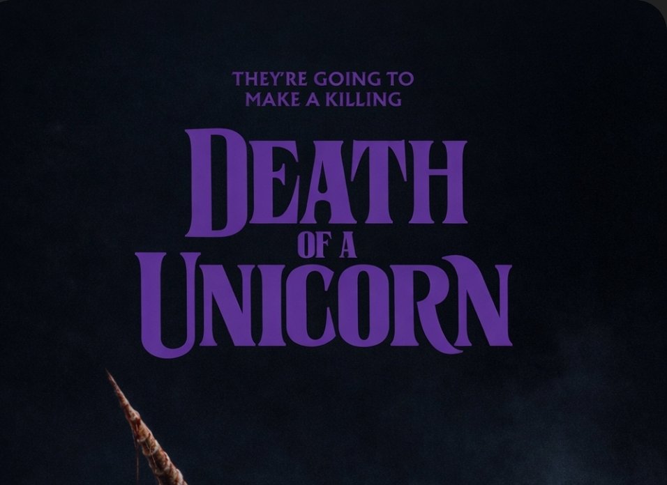 alt="Poster for the film 'Death of a Unicorn' featuring bold purple text and a unicorn horn emerging from a dark background."
