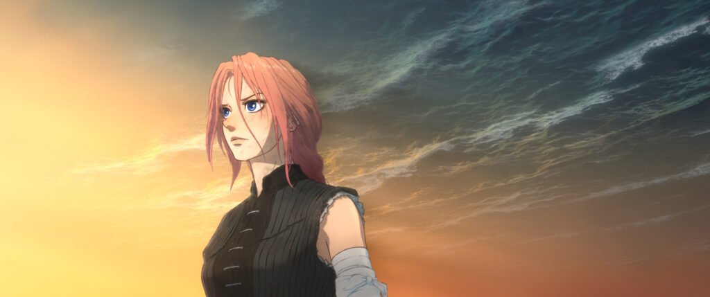 Alt = Movie still from the 2026 film “Scarlet,” showing a pink‑haired heroine with a determined expression against a dramatic sunset sky, used for a Scarlet anime movie review.