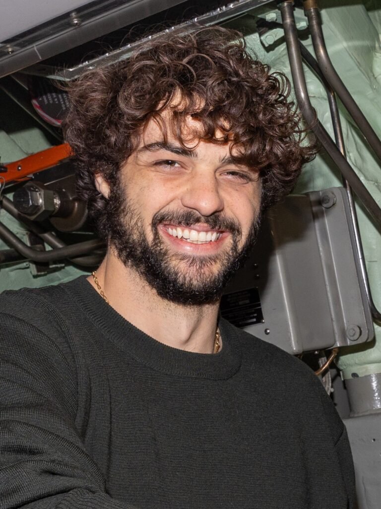 Alt = NORFOLK Actor Noah Centineo, from the show "The Recruit", left, poses for a photo with Electrician's Mate (Nuclear) 1st Class Ian Porter aboard the Los Angeles-class attack submarine USS Pasadena (SSN 752) Street Fighter movie trailer 2026