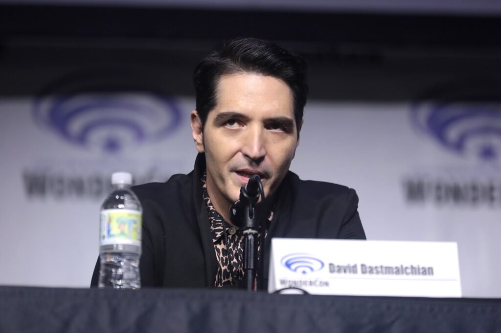 Alt = David Dastmalchian speaking at the 2023 WonderCon, for "Batman: The Doom That Came to Gotham", at the Anaheim Convention Center in Anaheim, California. Street Fighter movie trailer 2026