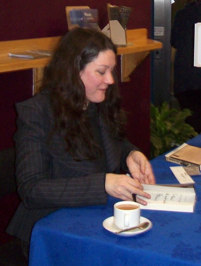 Alt = Author Helen Macdonald at a book signing. H is for hawk 