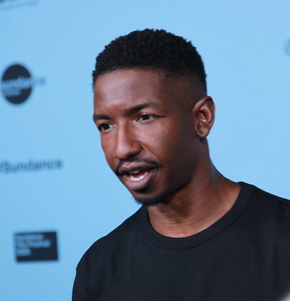 Alt = Mamoudou Athie, actor, at the 2025 Sundance Film Festival for the movie By Design. The Drama Review 