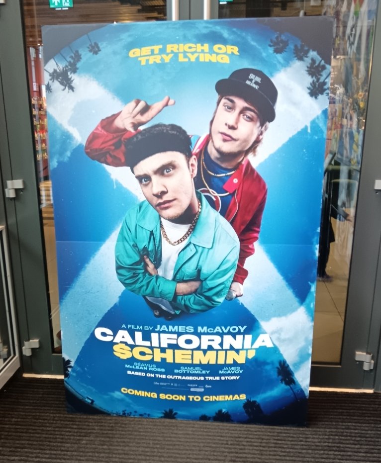 Alt text: James McAvoy California Schemin review. The  cinematic poster for the movie California schemin featuring the leading actors Séamus McLean and Samuel Bottomley