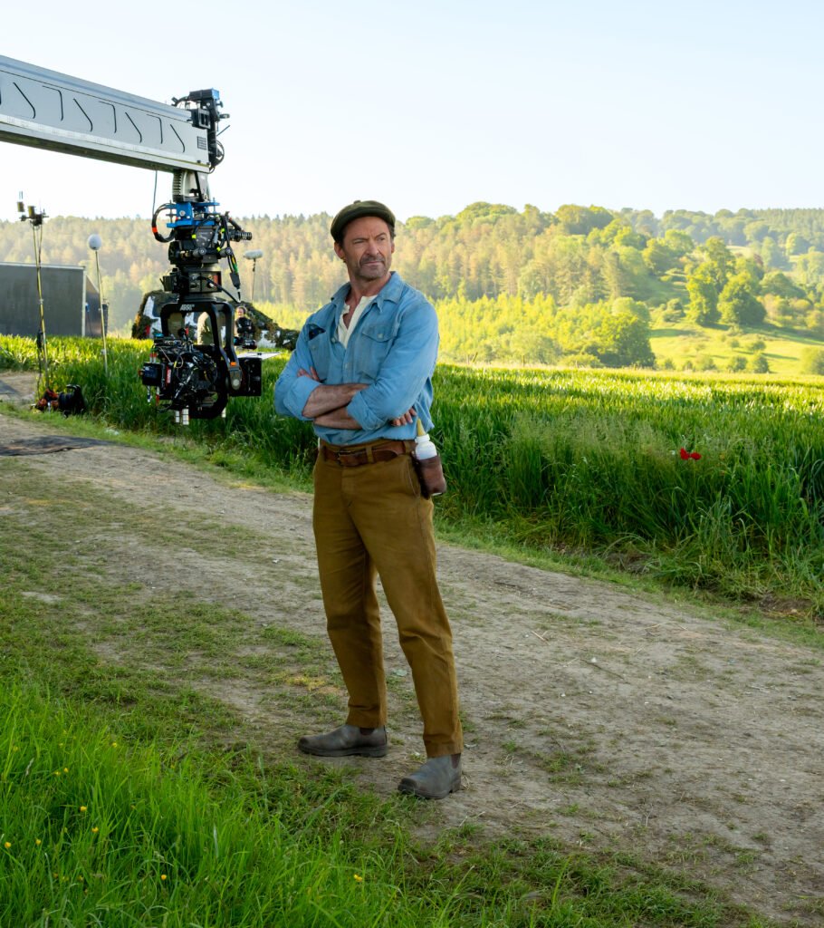 Alt = Actor Hugh Jackman on the set of his film THE SHEEP DETECTIVES, from Amazon MGM Studios. Photo credit: Alex Bailey © 2026 Amazon Content Services LLC. All Rights Reserved.
Sheep Detectives Movie Review