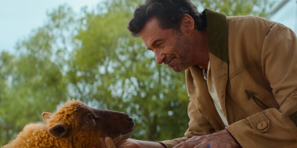 Alt = (L to R) Julia-Louis Dreyfus as the voice of Lily and Hugh Jackman as George Hardy in THE SHEEP DETECTIVES, from Amazon MGM Studios.
Photo credit: Courtesy of Amazon MGM Studios
© 2026 Amazon Content Services LLC. All Rights Reserved.

Sheep Detectives Movie Review
