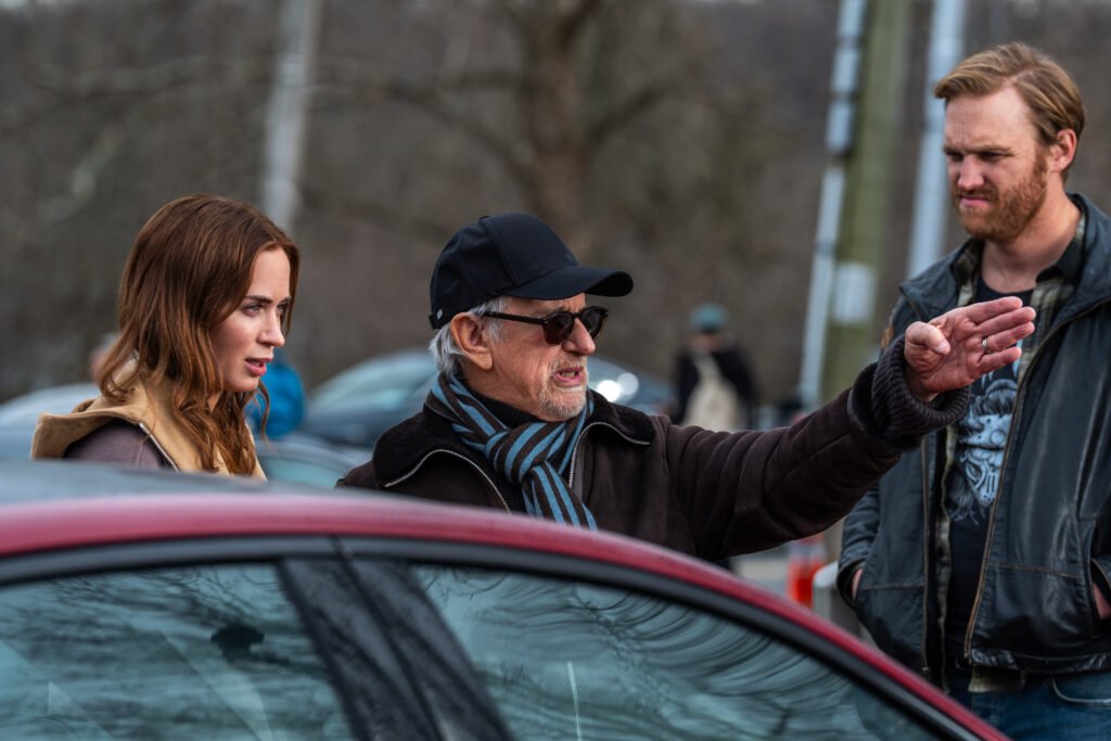 Alt = L to R: Emily Blunt, Director Steven Spielberg, and Wyatt Russell on the set of DISCLOSURE DAY, directed by Steven Spielberg. 2026© Universal Studios. All Rights Reserved.
Disclosure Day movie review