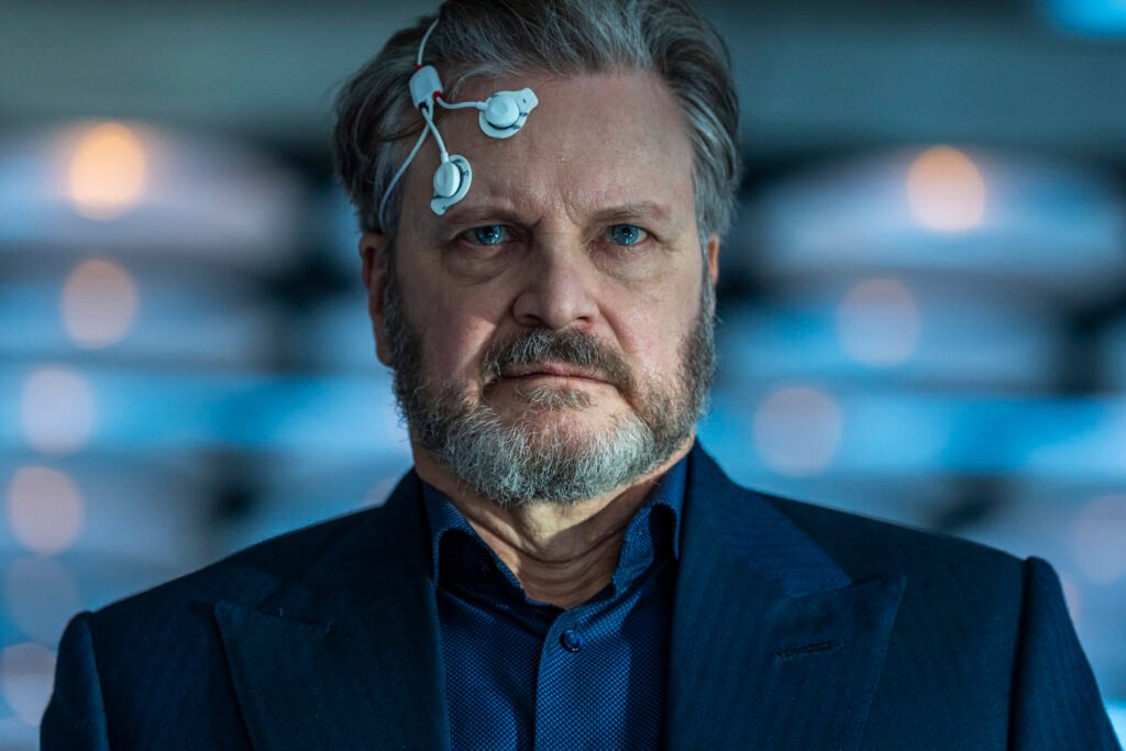 Alt = Colin Firth in DISCLOSURE DAY, directed by Steven Spielberg. ©Universal Studios. All Rights Reserved.