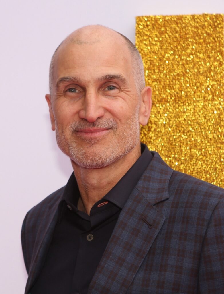 Alt = SYDNEY, AUSTRALIA - JANUARY 23 Craig Gillespie arrives at the Australian Premiere of 'I, Tonya' on January 23, 2018 in Sydney, Australia photo by Eva Rinaldi

Eva Rinaldi from Sydney Australia

Creative Commons Attribution-Share Alike 2.0
Supergirl (2026) Review
