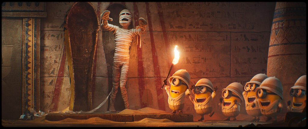 Alt = Center L to R: Dick, Ed, James, Henry and additional Minions in Illumination’s Minions & Monsters, directed by Pierre Coffin.
© Universal Studios. All Rights Reserved.
Minions & Monsters Review