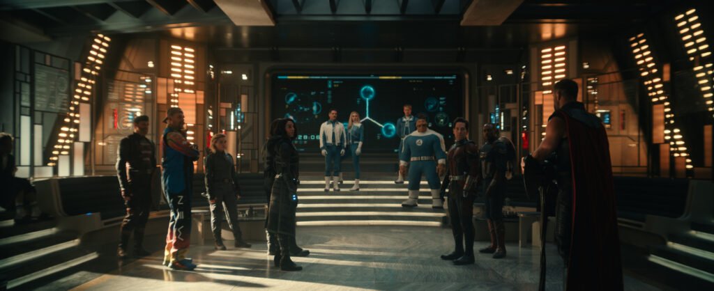 Alt = (L-R): John Walker/U.S. Agent (Wyatt Russell), Alexei/Red Guardian (David Harbour), Yelena (Florence Pugh), Bucky Barnes/Winter Soldier (Sebastian Stan), Ava/Ghost (Hannah John-Kamen), Reed Richards/Mister Fantastic (Pedro Pascal), Sue Storm/Invisible Woman (Vanessa Kirby), Johnny Storm/Human Torch (Joseph Quinn), Ben Grimm/The Thing (Ebon Moss-Bachrach), Scott Lang/Ant-Man (Paul Rudd), Sam Wilson/Captain America (Anthony Mackie), and Thor (Chris Hemsworth) in Marvel's AVENGERS: DOOMSDAY. Photo courtesy of Marvel. © 2026 Marvel. All Rights Reserved
