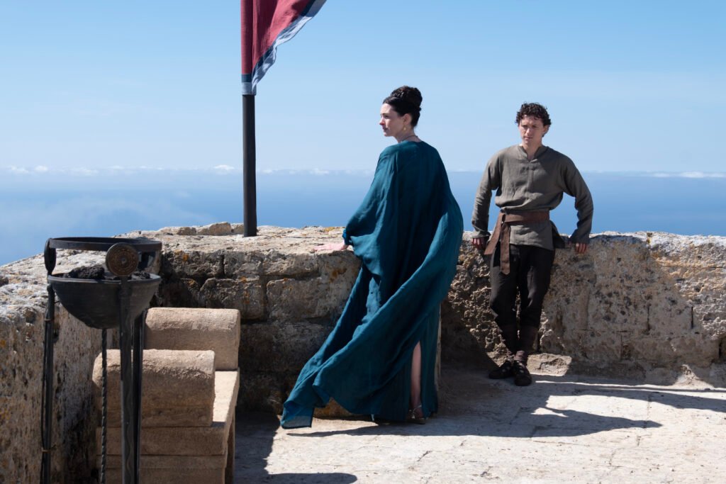 Alt = L to R: Anne Hathaway is Penelope and Tom Holland is Telemachus in THE ODYSSEY, written, produced, and directed by Christopher Nolan. © Universal Pictures 2026
The Odyssey Review