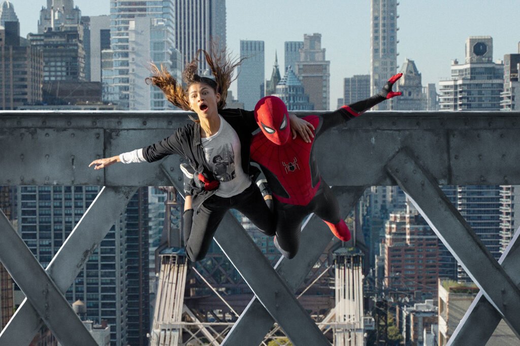 Alt = Zendaya as MJ And Tom Holland as Peter Parker/Spider-Man in Spider-Man: No Way Home © 2021 Sony Pictures Entertainment Inc. and Marvel Studios, LLC. All Rights Reserved.
Spider-Man: No Way Home Review