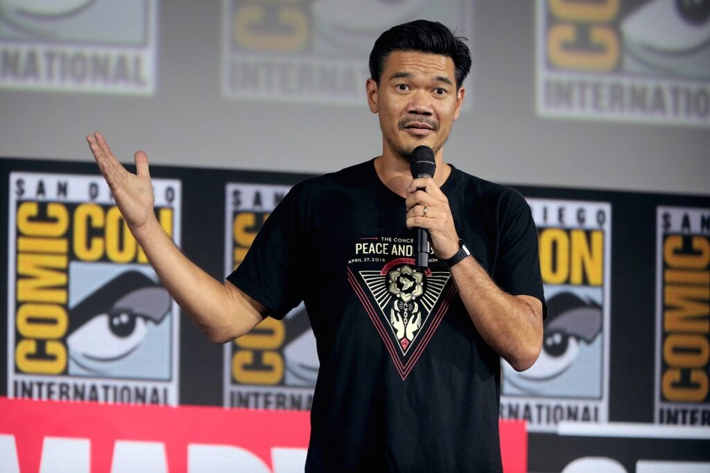 Alt = Destin Daniel Cretton speaking at the 2019 San Diego Comic Con International. By Gage Skidmore. ©Creative Commons Attribution-Share Alike 2.0
Spider-Man: Brand New Day Review