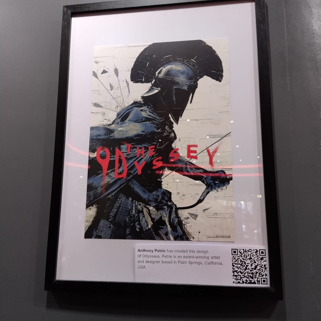 Alt = Features a highly stylized, textured depiction of Odysseus clad in ancient armor and a Corinthian-style helmet.