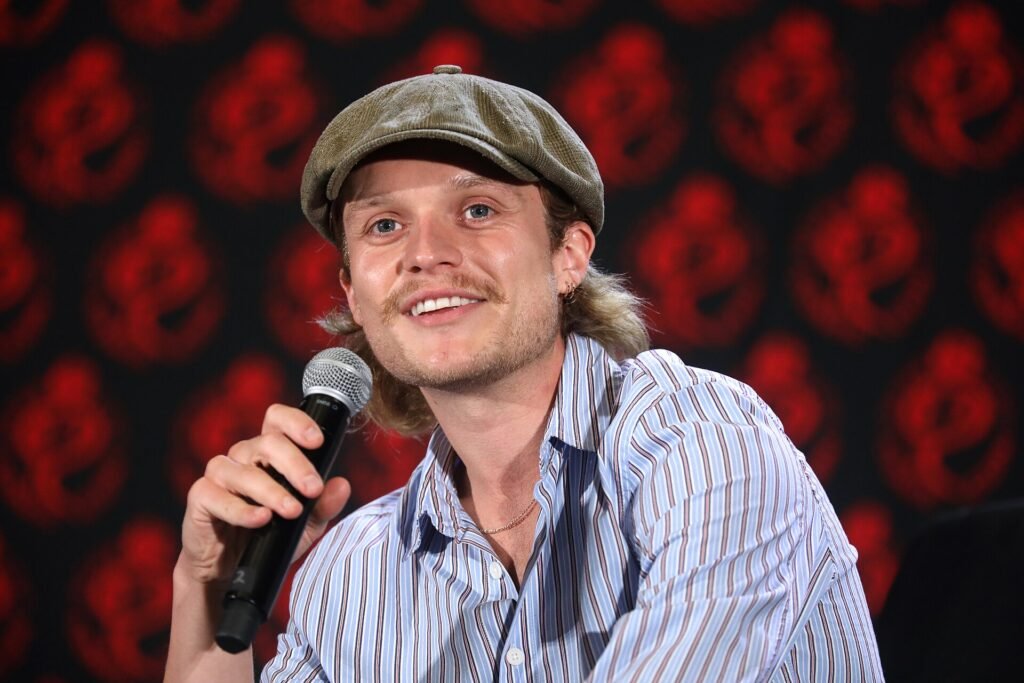 Alt = Tom Glynn-Carney speaking at the 2024 Rose City Comic Con at the Oregon Convention Center in Portland, Oregon. By Gage Skidmore  ©Creative Commons Attribution-Share Alike 2.0
House Of The Dragon Season 3 Review