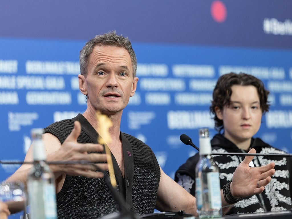 Alt = Actor Neil Patrick Harris And Bella Ramsey at the 2026 Berlin International Film Festival By Harald Krichel ©Creative Commons Attribution-Share Alike 4.0
Sunny Dancer Movie Review