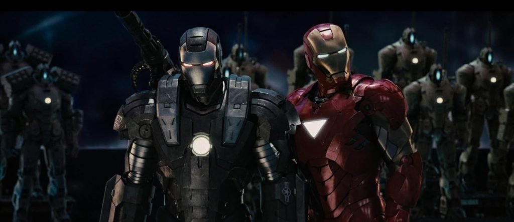 Alt = Don Cheadle and Robert Downey Jr. in Iron Man 2 (2010) ©Marvel Studios and the Walt Disney Company. All rights reserved.
Iron Man 2 Review