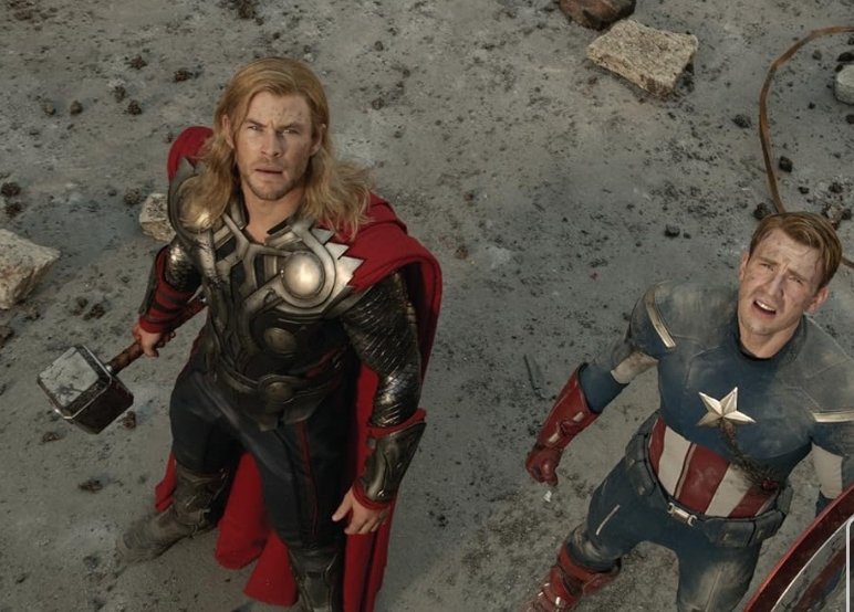 Alt = Chris Hemsworth as Thor and Chris Evans as Captain America in The Avengers (2011) ©Marvel Studios and the Walt Disney Company. All rights reserved
