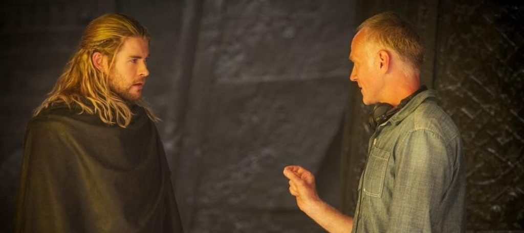 Alt = Chris Hemsworth and director Alan Taylor on the set of  Thor The Dark World (2013). ©Marvel Studios and the Walt Disney Company. All rights reserved
Thor: The Dark World Review