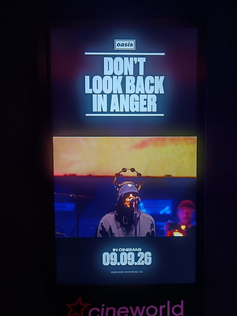 Alt = movie poster for the movie oasis Don't look back in anger
Oasis: Don’t Look Back in Anger Review