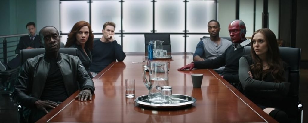 Alt = Don Cheadle, Scarlett Johansson, Robert Downey Jr., Chris Evans, Anthony Mackie, Paul Bettany, and Elizabeth Olsen, in Captain America: Civil War (2016) ©Marvel Studios and the Walt Disney Company. All rights reserved.
Captain America Civil War Review
