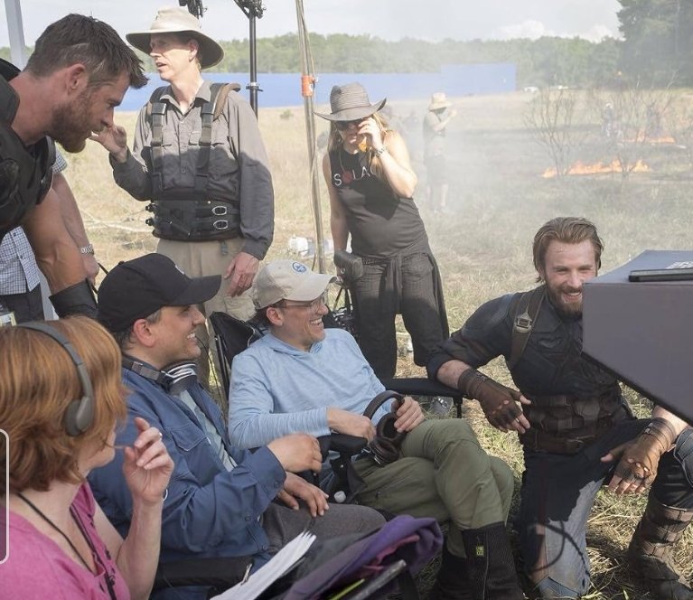 Alt = Chris Hemsworth, Joe Russo, Anthony Russo, and Chris Evans on the set of Avengers: Infinity War (2018) ©Marvel Studios and the Walt Disney Company. All rights reserved.
Avengers: Infinity War Review
