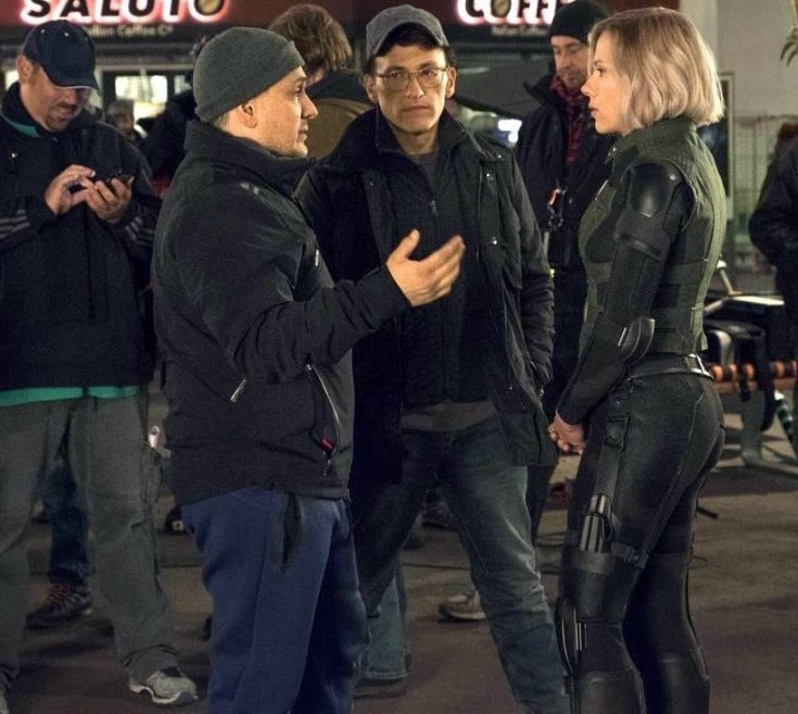 Alt = Joe Russo, Anthony Russo, and Scarlett Johansson, on the set of Avengers: Infinity War (2018) ©Marvel Studios and the Walt Disney Company. All rights reserved.
Avengers: Infinity War Review