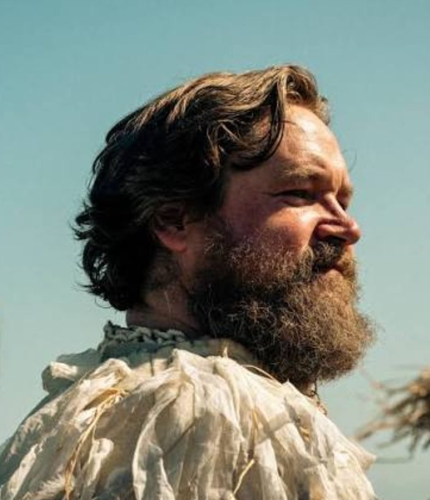 Alt = Grant O'Rourke in The Incomer 2026. Image Courtesy of Universal Pictures and Focus Features
The Incomer Movie Review