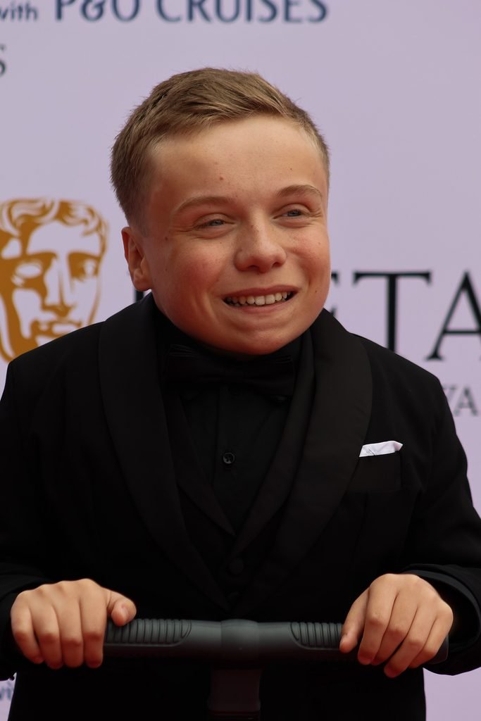 Alt = Lenny Rush at the TV BAFTA red carpet May 26 By JaceMerlyn ©Creative Commons Attribution-Share Alike 4.0Slow Horses Season 6 Review